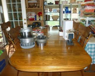 Vintage oval oak table w/wide leaf and 4 pressed back chairs