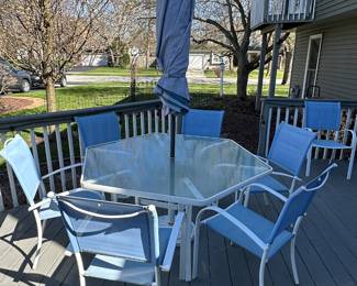 Glass table with 6 Chairs and Umbrella