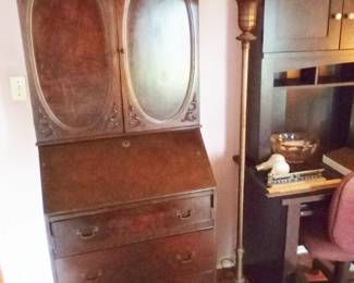 Next to the Secretary is an original Rembrandt torch floor lamp from the 30's