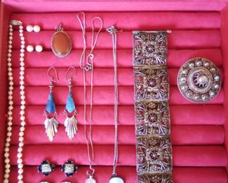 Some sterling.  Pearls with gold clasp. Not mine