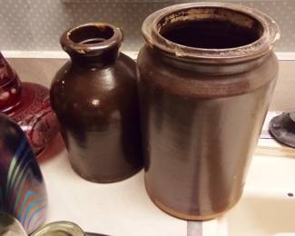 Primitive brown stoneware crocks