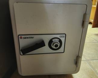 Sentry safe on casters (have combination)