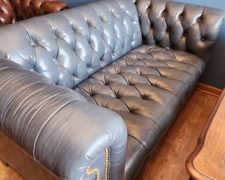 Navy blue leather Chesterfield sofa