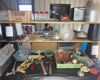 hammers, tools, toy tractors, heat lamps. 