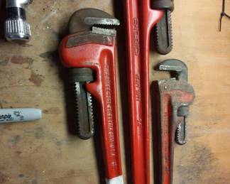 Large Rigid pipe wrenches 24", 18", 12" and others.