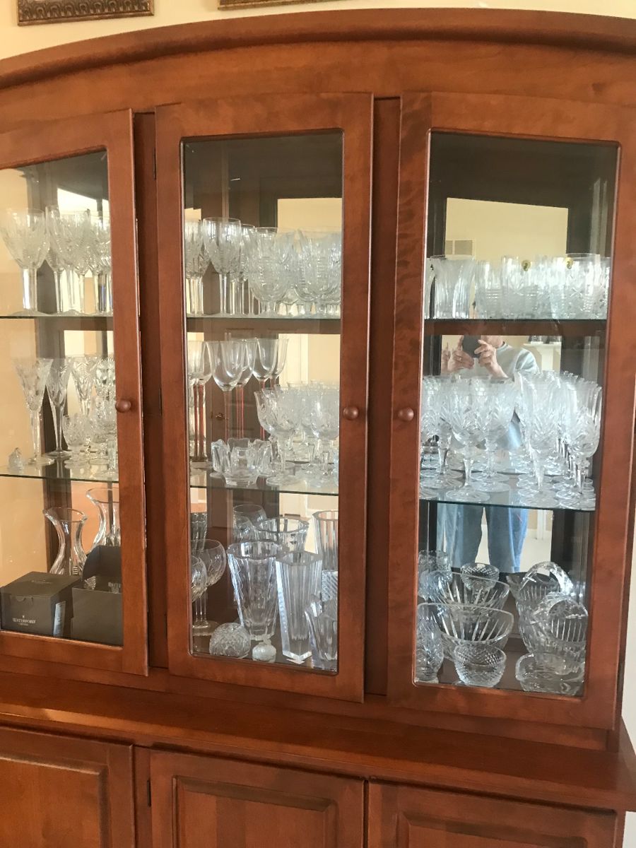 Clayton Marcus of Henderson N.C., hardwood china cabinet. This is  filled with crystal pieces from Waterford, Galway, Baccarat and Orrefors!