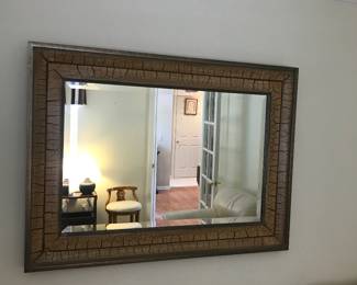 Sharp gold crackled finished wall mirror, this home has a nice mirror in every room on both levels!