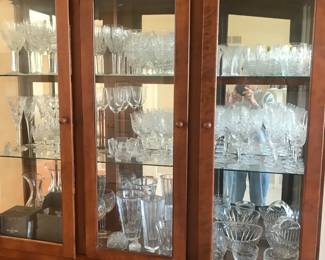 Clayton Marcus of Henderson N.C., hardwood china cabinet. This is  filled with crystal pieces from Waterford, Galway, Baccarat and Orrefors!