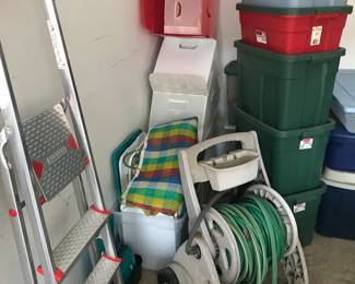 Numerous storage tub's! Ladders to reach new heights and a hose and reel combo!