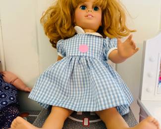 American Girl doll with lots of extra clothes