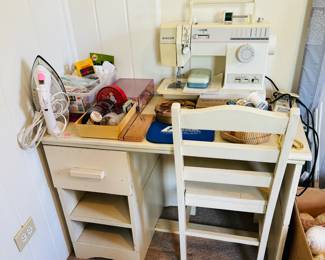Desk and chair. Can be a sewing table