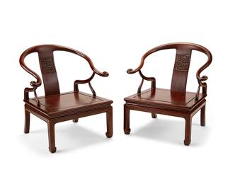 3134
20th century
A Pair Of Chinese Quanyi Chairs
Each chair featuring crest rails of a modified horseshoe shape surmounting a carved back splat, supported by curvilinear arms set into a flat beveled seat set upon four legs, 2 pieces
Each: 30.5" H x 28.75" W x 25.5" D
Estimate: $400 - $600