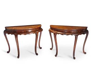 3130
19th century
A Pair Of Chinese Demilune Tables
The wood console tables in the manner of Queen Anne style, featuring mortise and tenon joints and a carved apron decorated with a yin and yang symbol, supported on four curvilinear legs with scroll feet, 2 pieces
Each: 32.5" H x 46" W x 23.25" D approximately
Estimate: $500 - $700