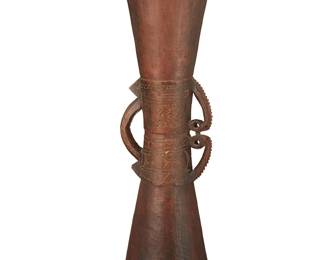 3166
19th century; New Guinea
A Papuan Kundu Hourglass Drum
The carved wood drum with lizard skin drumhead, banded motifs, and opposed carved handles, one with sawtooth edge
25.25" H x 7" Dia.
Estimate: $50 - $100