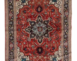 3127
Late 20th century
A Tabriz Area Rug
The wool-on-cotton rug featuring a blue border and medallion with geometric motifs on a red ground
9' 6" L x 6' 6" W
Estimate: $500 - $700