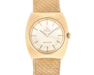 3034
An Omega Gold Wristwatch
14K gold
Dial: square case, round dial, 24mm
Movement: automatic
Case: 14k yellow gold case with integrated bracelet with textured surface finish
Case Size: 15mm x 17mm

57.7 grams gross
7.5" L; Bracelet Width: 4-8mm
Estimate: $800 - $1,200