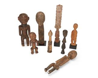 3164
20th century
A Group Of African Carved Wood Figures
Comprising ancestor figures, a totemic figure, and others, two on wood stands and one on a metal stand, 8 pieces
Tallest: 16" H; Shortest: 9" H
Estimate: $200 - $400
