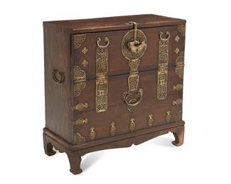 3137
20th century
A Korean Bandaji
The tall, dark wood blanket chest with drop-front top door, paper-lined interior, and fitted with reticulated brass hardware and opposed handles, raised on four bracket feet
38.25" H x 36.25" W x 17" D
Estimate: $300 - $500