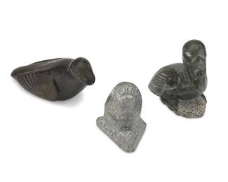 3159
Three Inuit Carved Stone Figures
Three works:

Allie Kasudluak
(1926-1982, Inuit; Port Harrison/Inukjuak)
Carved bird figure with incised feathers
Stone
Signed syllabically to underside
3.25" H x 6.5" W x 2.75" D

Josie Pamiutu Papialuk
(1918-1996, Inuit; Povungnituk/Puvirnituq)
Carved seal head breaching ice, circa 1986
Stone
Signed to underside: Josie Papialook [sic] / © / 81; further marked with partially illegible disc number
2.875" H x 2.5" W x 2.75" D

Davidee Saumik
(1925-1984, Inuit; Port Harrison/Inukjuak)
Carved duck
Stone
Signed syllabically to underside; further marked: 187391
4" H x 4.25" W x 2" D

3 pieces
Estimate: $100 - $200