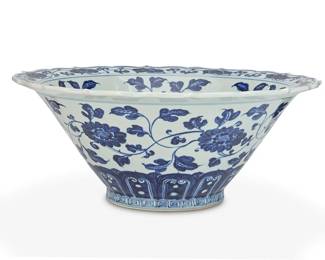 3100
20th century
A Chinese Blue And White Porcelain Bowl
With apocryphal reign mark for Ming Dynasty Xuande Period
The glazed white porcelain basin with blue underglaze floral motifs
6.75" H x 16.5" Dia.
Estimate: $100 - $200