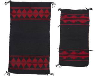 3152
Two Navajo Moki-Style Dresses
20th century, Diné
Each formed of two pieces woven in black and red wool with stepped and serrated banding to ends, each constructed with shoulder and side seams, 2 pieces
Larger: 36" H x 19.5" W; Smaller: 28" H x 13.75" W
Estimate: $300 - $500