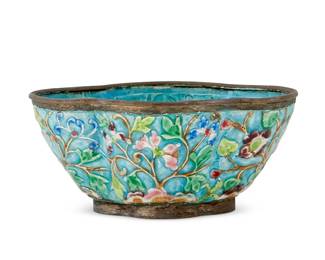 3103
20th century
A Chinese Enameled Metal Begonia Bowl
Stamped to underside: China
The enameled metal bowl with repoussé floral motif throughout
2.625" H x 5.875" W x 4.625" D
Estimate: $200 - $400