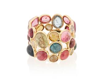 3030
A Multi-Color Tourmaline Ring
Featuring multi-color fancy-shaped tourmalines weighing 16.95 carats set in 14K gold

6.2 grams gross
Ring Size: 7.5
Estimate: $800 - $1,200
