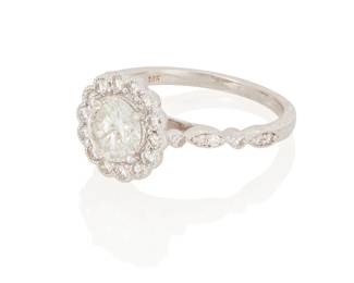 3040
A Diamond Ring
Centering a round brilliant-cut diamond weighing approximately 1.10 carats accented by 24 round brilliant-cut diamonds weighing approximately .24 carat set, in 18K white gold

3.8 grams gross
Ring Size: 7
Estimate: $1,500 - $2,000