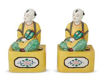 3086
20th century
A Pair Of Chinese Export Enameled Porcelain Figures
Each unmarked
Two polychrome enameled ceramic figures, each depicting a young man with a fan seated upon a raised platform with floral medallions, 2 pieces
Each: 8.25" H x 5.5" W x 4" D
Estimate: $800 - $1,200