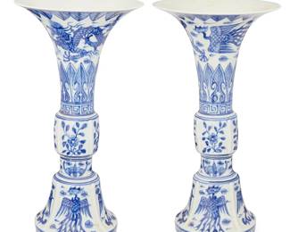 3092
20th century
A Pair Of Chinese Blue And White Gu-Form Porcelain Vases
Each marked to the underside in blue underglaze bearing an apocryphal reign mark for Xuande Period (1426-1435) of the Ming Dynasty (1368-1644)
Each with blue underglaze decoration of dragon, phoenix, and floral motifs and leaf banding to the neck, 2 pieces
Each: 11.25" H x 6" Dia.
Estimate: $300 - $500