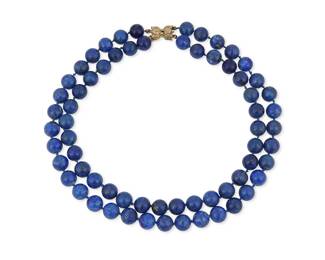 3021
A Lapis Bead Necklace With A Bow Clasp
Designed with 60 round lapis lazuli beads measuring approximately 12 mm, terminating in a gold bow clasp
24" L
Estimate: $400 - $600