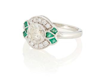 3043
A Diamond And Emerald Ring
Centering a round brilliant-cut diamond weighing 1.05 carats accented with 6 mixed-cut emeralds weighing approximately .05 carat and further accented with 12 round brilliant-cut diamonds weighing approximately .12 carat set in 18K white gold

5.2 grams gross
Ring Size: 7
Estimate: $1,200 - $1,500