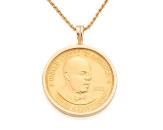 3026
A U.S. Mint Gold Louis Armstrong Coin Pendant Necklace
Centering upon a 1982 one ounce gold coin, within a circular gold frame, reverse of the pendant inscribed 'AMERICAN ARTS COMMEMORATIVE SERIES', set in 14K gold suspended by a gold chain
Chain: 32" L; Pendant: 28 mm dia
Estimate: $1,500 - $2,000