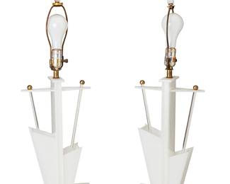 3195
1950s
A Pair Of Moss Electric Co. Plexiglas Table Lamps
Each unmarked
Each dual-light Plexiglas lamp in angular vase form, with lighted base and brass components, electrified, 2 pieces
Each: 30.5" H x 10.875" W x 6.375" D
Estimate: $300 - $500
