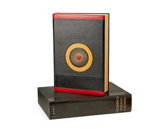 3226
Dante Alighieri
1265-1321
"La Divina Commedia Or The Divine Vision Of Dante Alighieri"
Hardcover book in a custom case
Edition: 289/1475
Alighieri, Dante. "La Divina Commedia Or the Divine Vision of Dante Alighieri." London: Nonesuch Press, 1928
The book rebound by Bernard Middleton in full black and red leather, with a geometric medallion gilt-stamped to front cover and gilt edges, housed in a conformingly constructed case with gilt-stamped spine
In case: 13" H x 9.25" W x 2.75" D
Estimate: $300 - $500