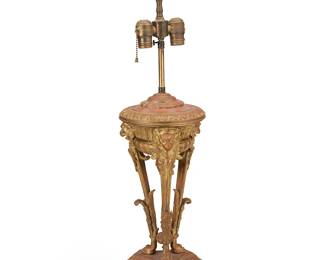 3118
Early 20th century
An Empire-Style Gilt-Bronze Table Lamp
Unmarked
The two-light urn-form lamp with central pinecone drop finial, raised on three acanthus leaf legs with lion masks and paw feet at their terminuses, set on an architectural base, electrified
30.125" H x 8.75" W x 8.75" D
Estimate: $150 - $250