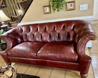 Gorgeous button tufted leather sofa