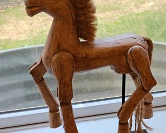 Carved horse sculpture