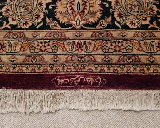 Persian signature to the 9x12 carpet.