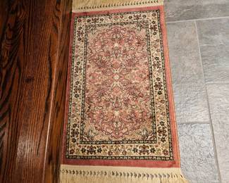 Another small area rug.