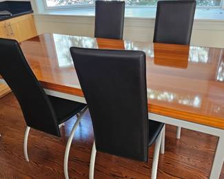 Like new dining table with four chairs from BoConcepts in Georgetown. 