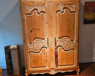 This beautiful pine Armour has plenty of storage and great style. The carving on this piece makes it so fine.