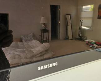 Flat-screen tv by Samsung 