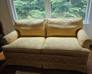Love seat in a lovely golden yellow fabric.. tone on tone. Custom upholstery and in excellent condition. 