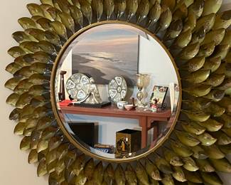 Large round beveled mirror with gold/green glass leaf design