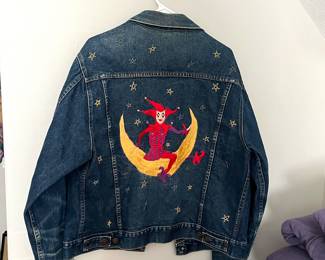 Great jean jacket with embroidery on back of court jester on the moon