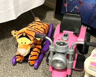 Tigger ride along and wheeled bike for young girl and boy
