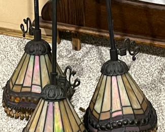 Set of three hanging light fixtures with stain glass style