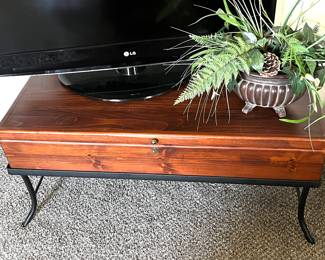 Very nice coffee table with storage, on iron stand