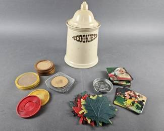 Lot 45 | Vintage Pfaltzgraff Village Cookie Jar & Coasters